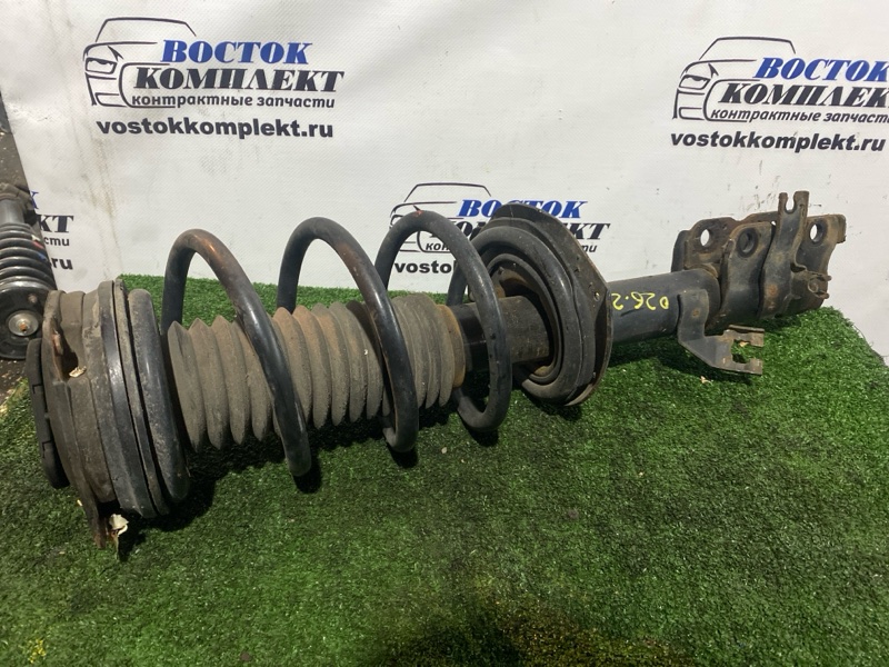 Стойка подвески Nissan Serena 2006 CNC25 MR20DE перед лев