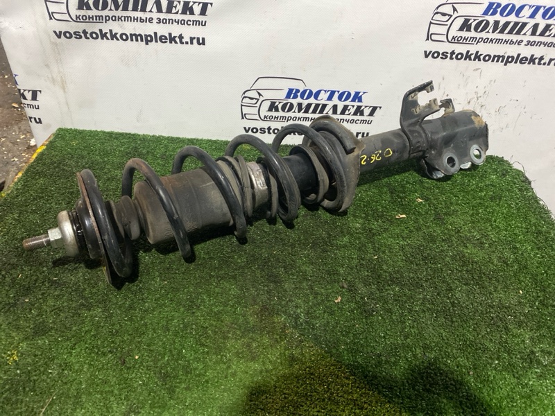 Стойка подвески Nissan March 2011 K13 HR12DE перед лев