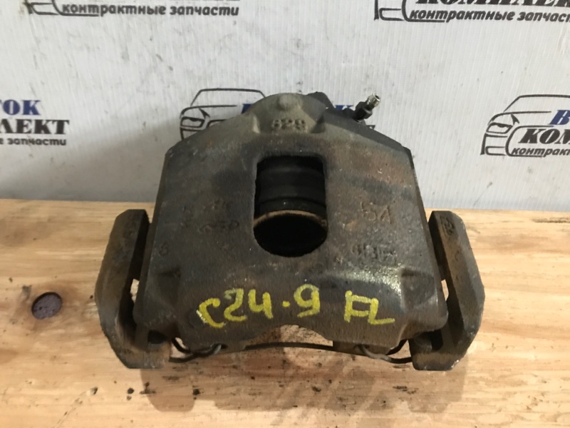 Суппорт Mazda Demio 2006 DY3W ZJ-VE перед лев