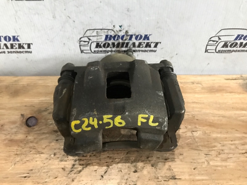 Суппорт Toyota Porte 2006 NNP15 1NZ-FE перед лев