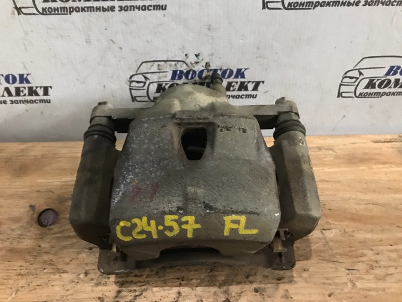 Суппорт Toyota Vitz 2008 SCP90 2SZ-FE перед лев