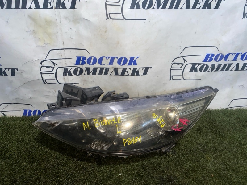 Фара Mazda Biante CCEAW LF-VD лев