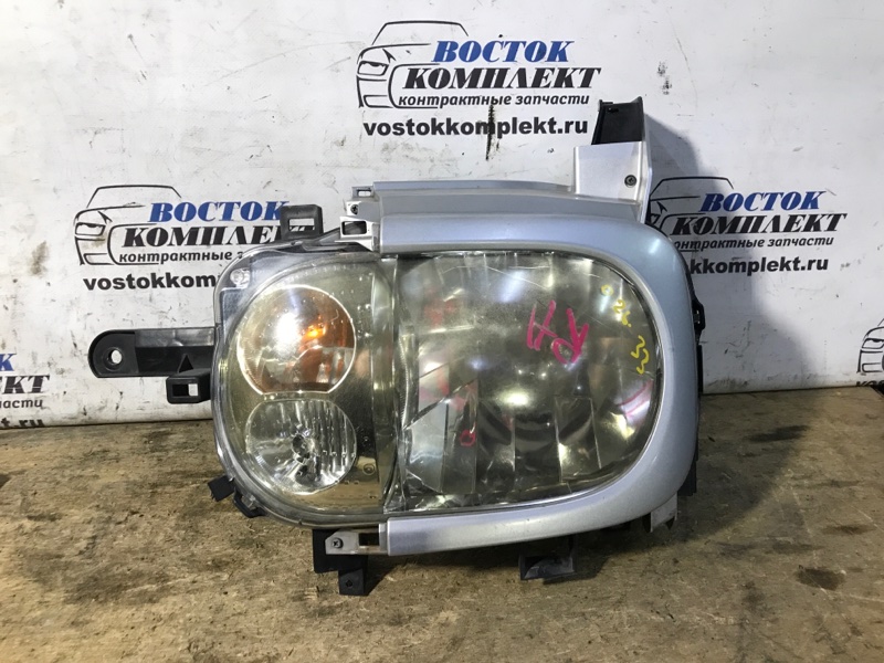 Фара Nissan Cube 2008 BZ11 CR14DE лев