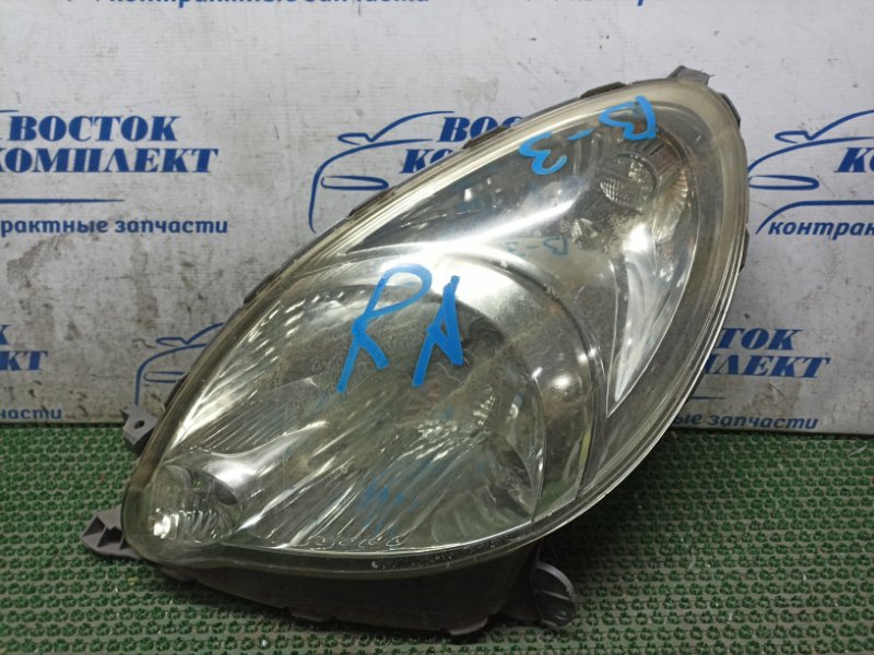 Фара Toyota Funcargo NCP20 1NZ-FE лев