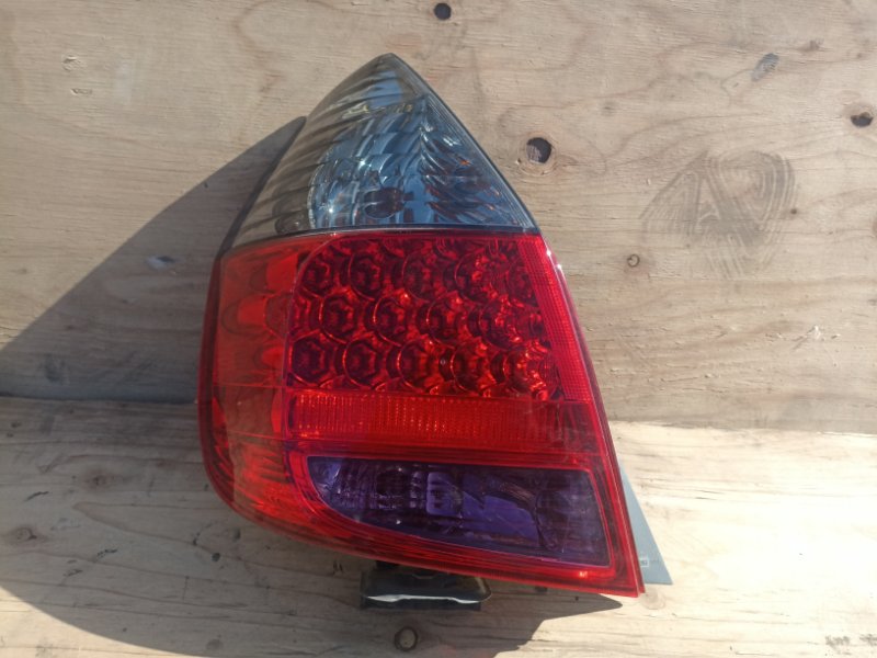 Фонарь стоп-сигнала Honda Fit GD1 L13A лев