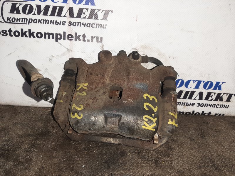 Суппорт Nissan March NK13 HR12DE перед лев