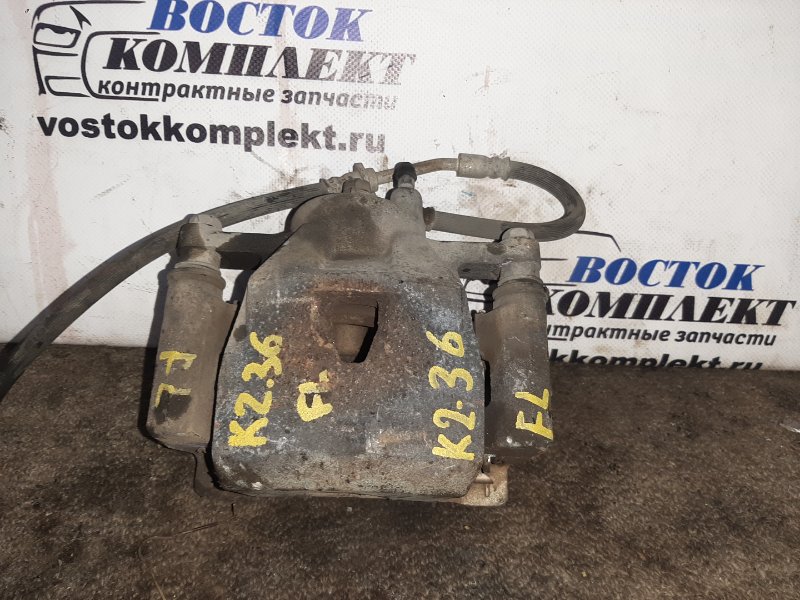 Суппорт Toyota Vitz 2012 NSP135 1NR-FE перед лев