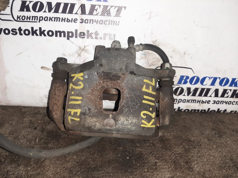 Суппорт Nissan Tiida Latio SC11 HR15DE перед лев