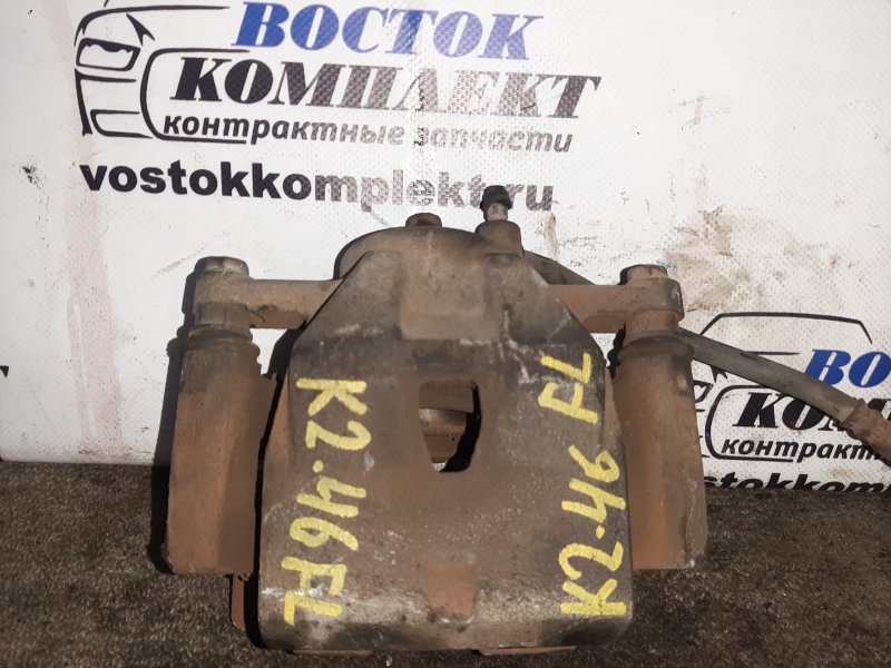 Суппорт Toyota Ractis 2005 NCP100 1NZ-FE перед лев