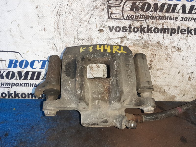 Суппорт Toyota Isis 2006 ANM15W 1AZ-FSE зад лев