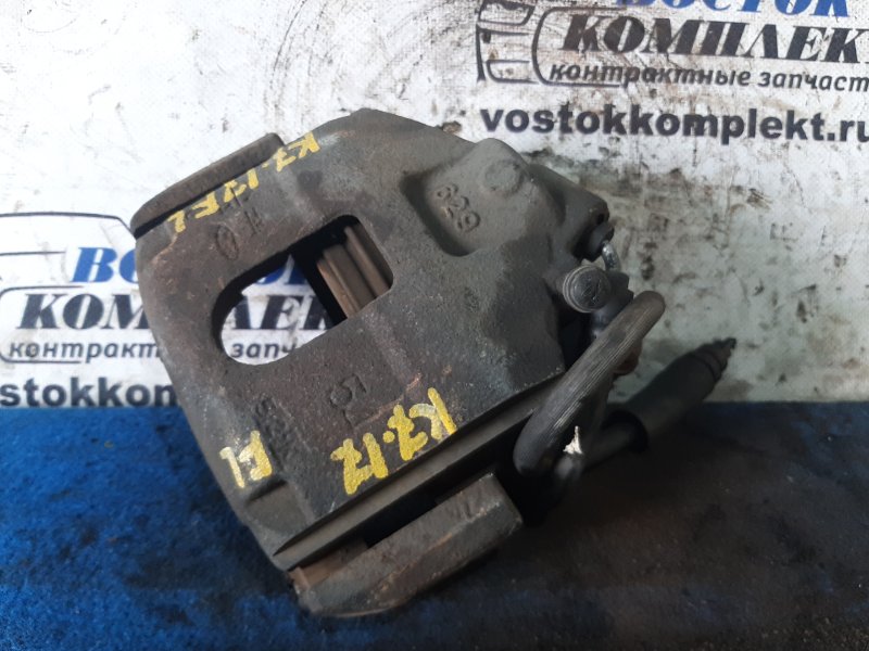 Суппорт Mazda Verisa 2005 DC5W ZY-VE перед лев