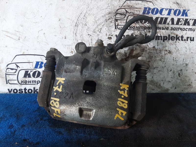 Суппорт Nissan Note E12 HR12DDR перед лев