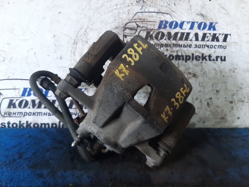 Суппорт Toyota Ractis 2009 SCP100 2SZ-FE перед лев