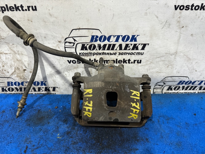 Суппорт Nissan Tiida Latio SC11 HR15DE перед прав