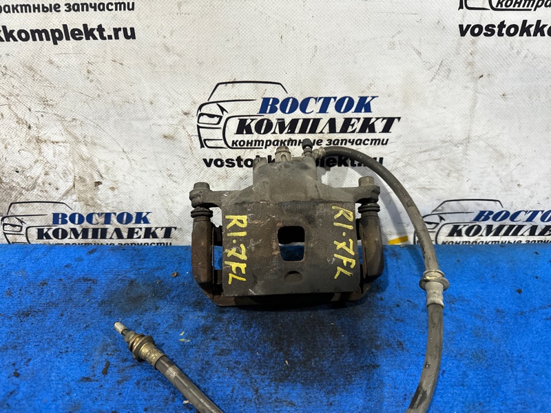 Суппорт Nissan Tiida Latio SC11 HR15DE перед лев