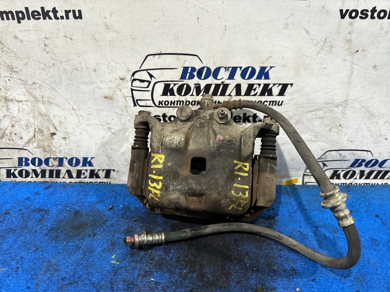 Суппорт Nissan March K13 HR12DE перед лев