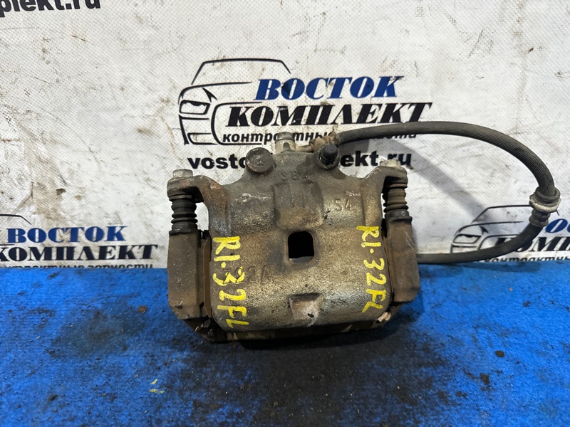 Суппорт Nissan Note E12 HR12DE перед лев