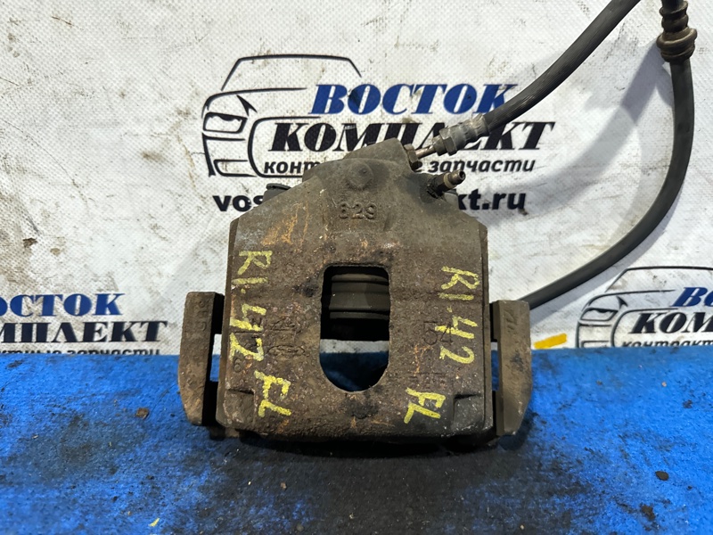 Суппорт Mazda Demio DY3R ZJ-VE перед лев