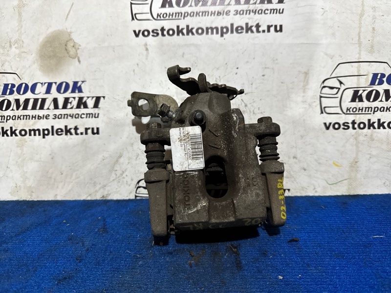 Суппорт Toyota Ist NCP115 1NZ-FE зад лев