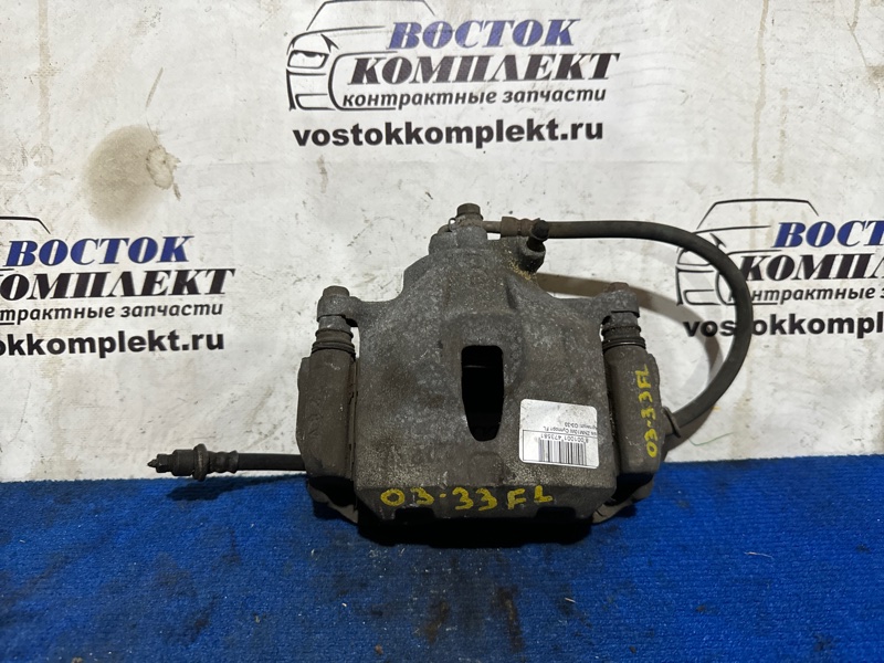 Суппорт Toyota Isis ZNM10G 1ZZ-FE перед лев