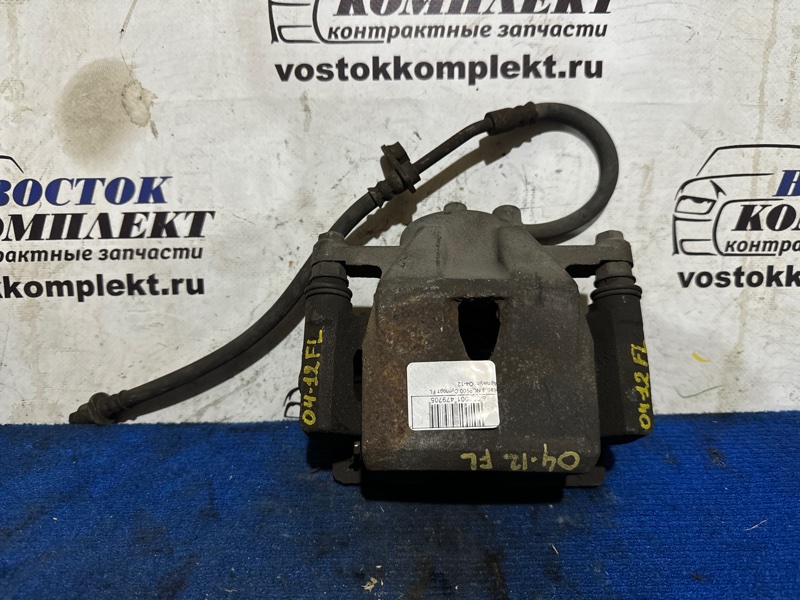 Суппорт Toyota Ractis NCP100 1NZ-FE перед лев