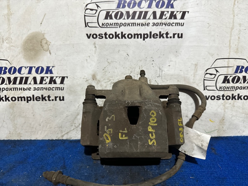 Суппорт Toyota Ractis SCP100 2SZ-FE перед лев