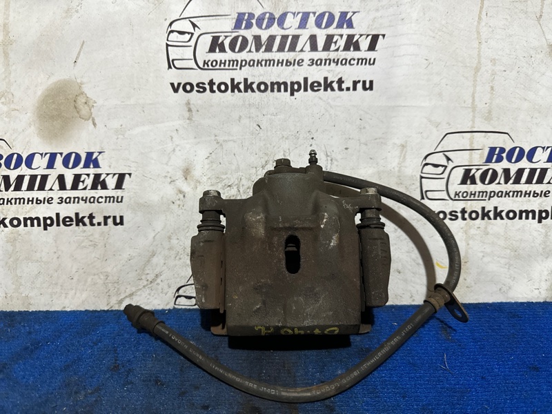 Суппорт Toyota Sienta NCP81G 1NZ-FE перед лев