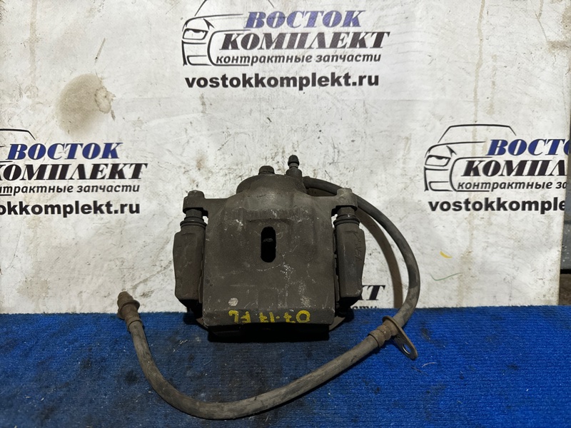 Суппорт Toyota Celica ZZT230 1ZZ-FE перед лев