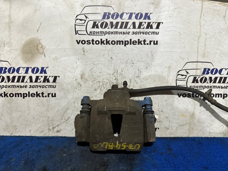 Суппорт Toyota Platz NCP12 1NZ-FE перед лев