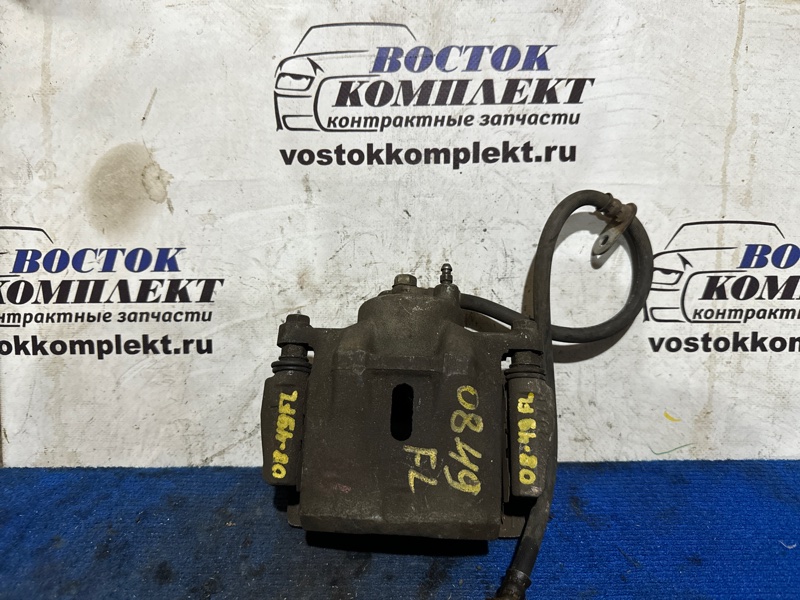 Суппорт Toyota Sienta NCP81G 1NZ-FE перед лев