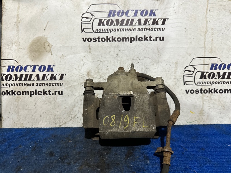 Суппорт Toyota Vitz SCP90 2SZ-FE перед лев