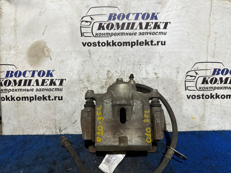 Суппорт Toyota Sienta NCP85G 1NZ-FE перед лев