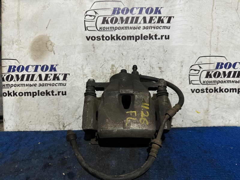 Суппорт Toyota Vitz NCP95 2NZ-FE перед лев