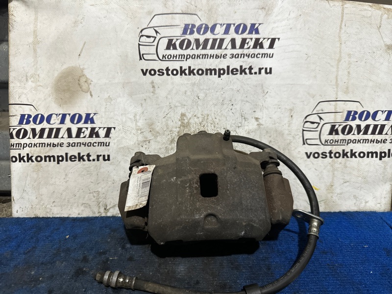 Суппорт Mitsubishi Grandis NA4W 4G69 перед лев