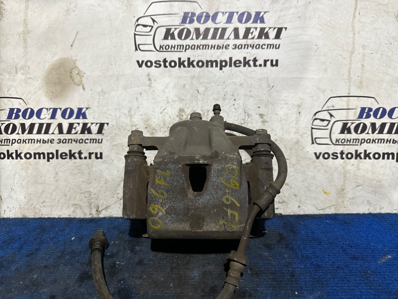 Суппорт Toyota Ractis SCP100 2SZ-FE перед лев