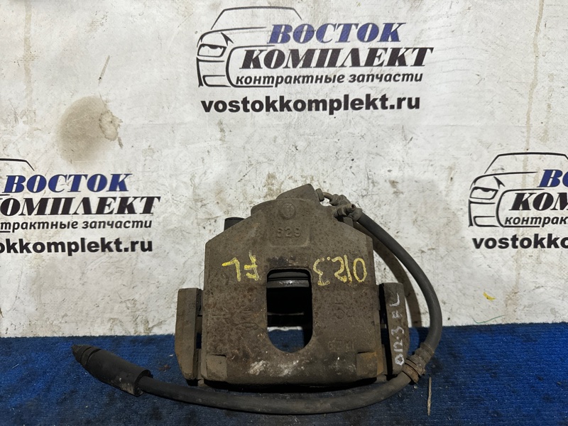 Суппорт Mazda Demio 2004 DY3W ZJ-VE перед лев