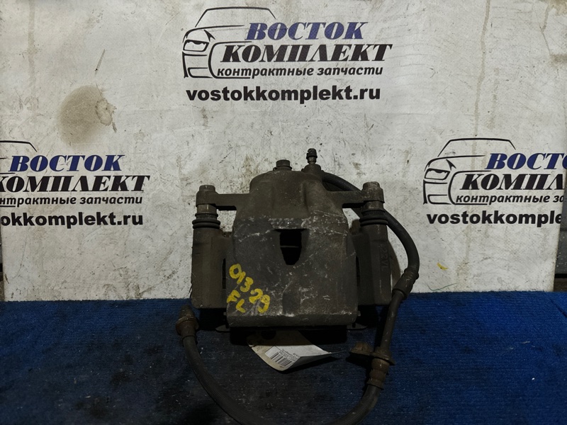 Суппорт Toyota Ractis 2012 NSP120 1NR-FE перед лев