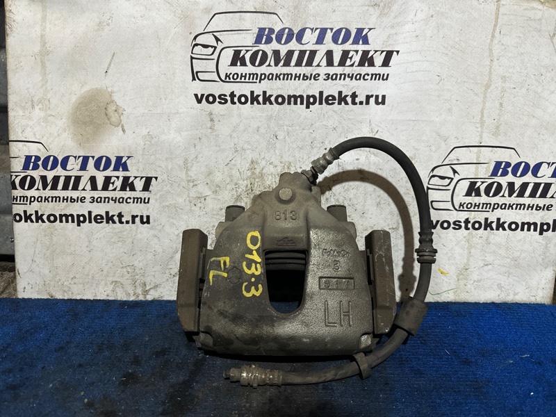 Суппорт Mazda Axela 2009 BK5P ZY-VE перед лев