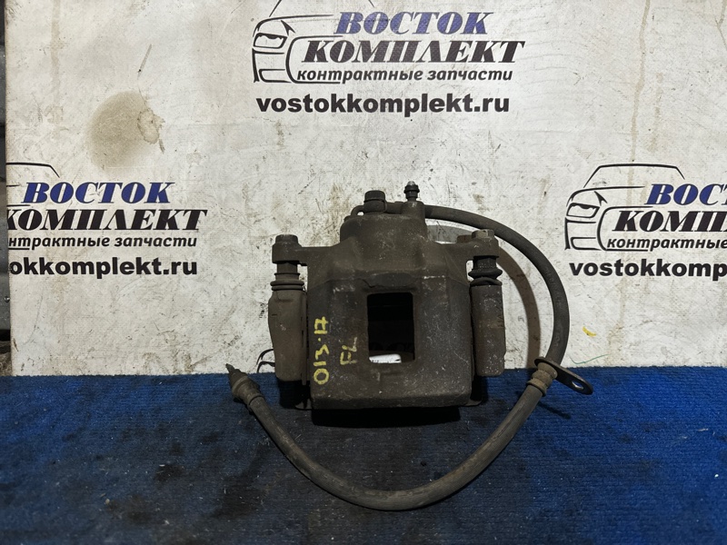 Суппорт Toyota Porte 2010 NNP15 1NZ-FE перед лев