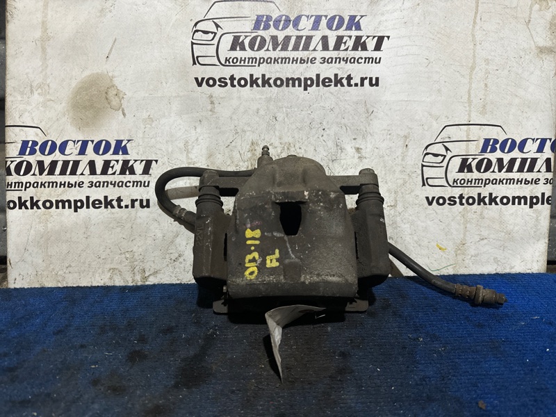 Суппорт Toyota Porte 2013 NCP145 1NZ-FE перед лев