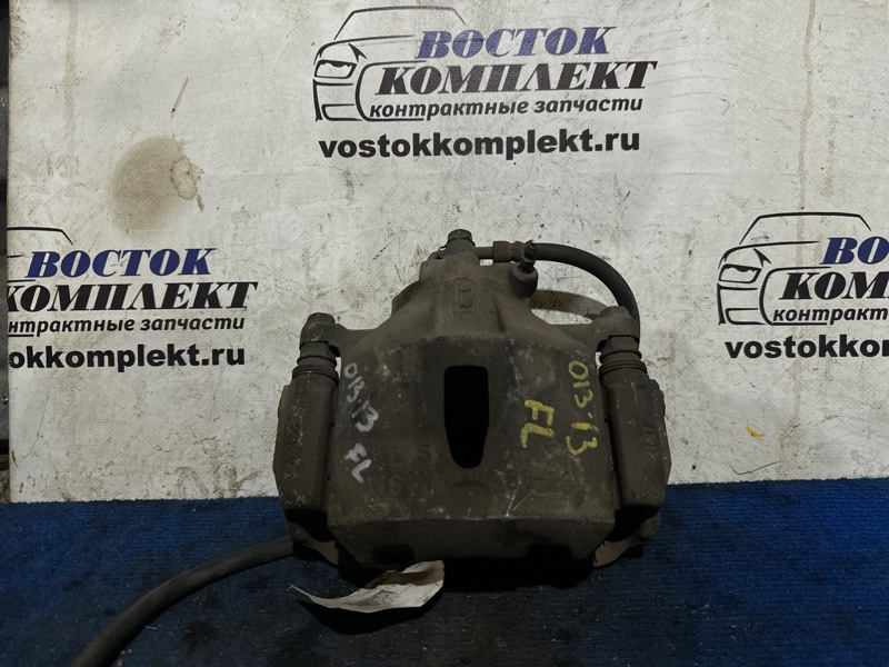 Суппорт Toyota Isis 2007 ANM10W 1AZ-FSE перед лев