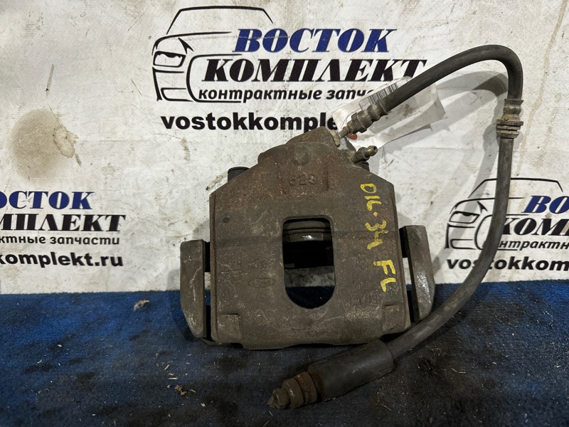 Суппорт Mazda Demio DY3R ZJ-VE перед лев