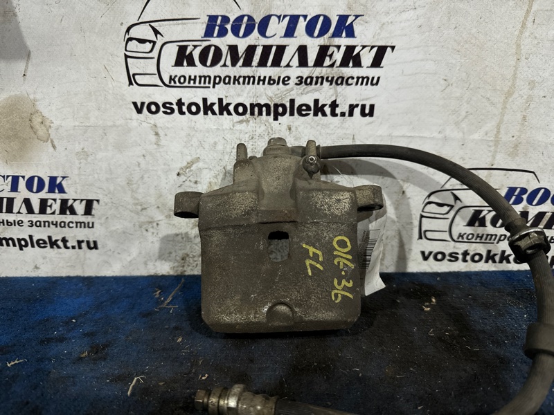 Суппорт Mitsubishi Colt Plus Z23W 4A91 перед лев