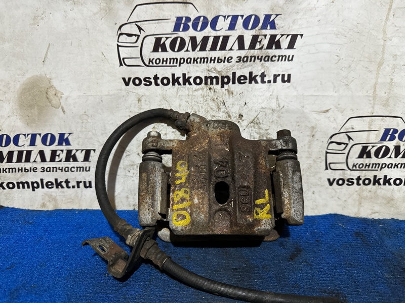 Суппорт Mitsubishi Debonair 1999 S26A 6G74 зад лев