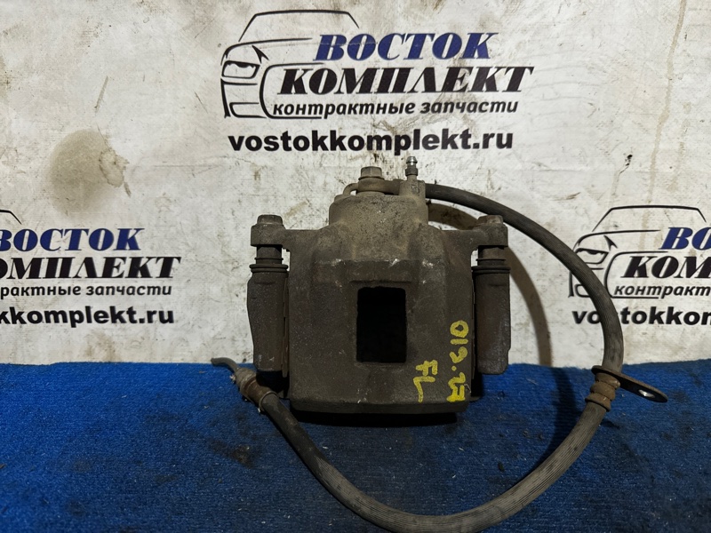 Суппорт Toyota Porte 2007 NNP15 1NZ-FE перед лев