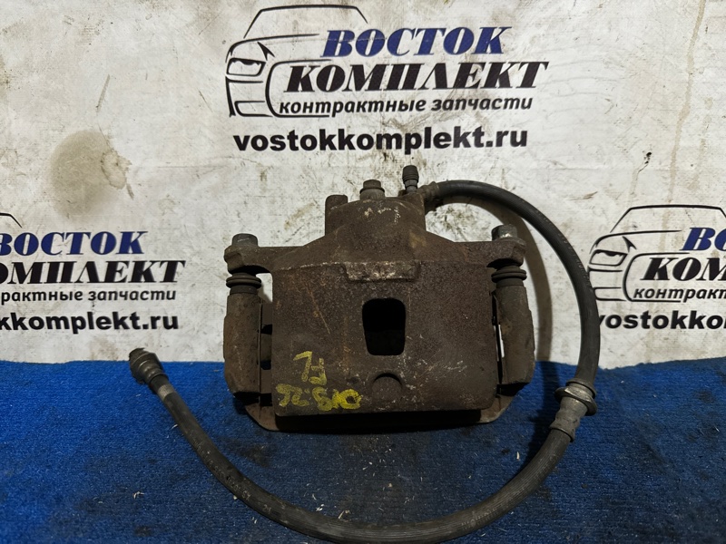 Суппорт Nissan Note E11 HR15DE перед лев