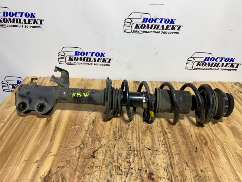 Стойка подвески Nissan March K13 HR12DE перед лев