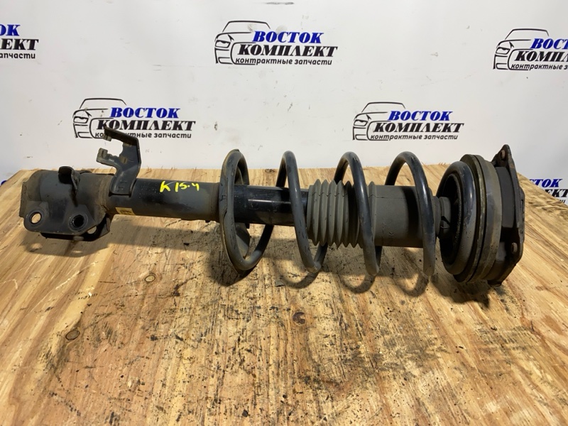 Стойка подвески Nissan March AK12 CR12DE перед лев