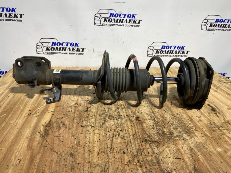 Стойка подвески Nissan March AK12 CR12DE перед прав