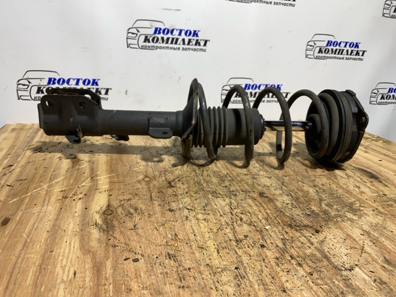 Стойка подвески Nissan March AK12 CR12DE перед прав